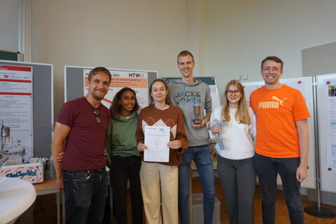 3 male and 3 female Phd/students with the certificate and the prize for the 3rd place in the competition